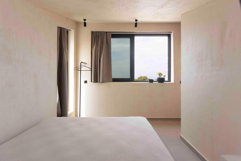 Pnoes Luxury Suites Палиури Экстерьер фото