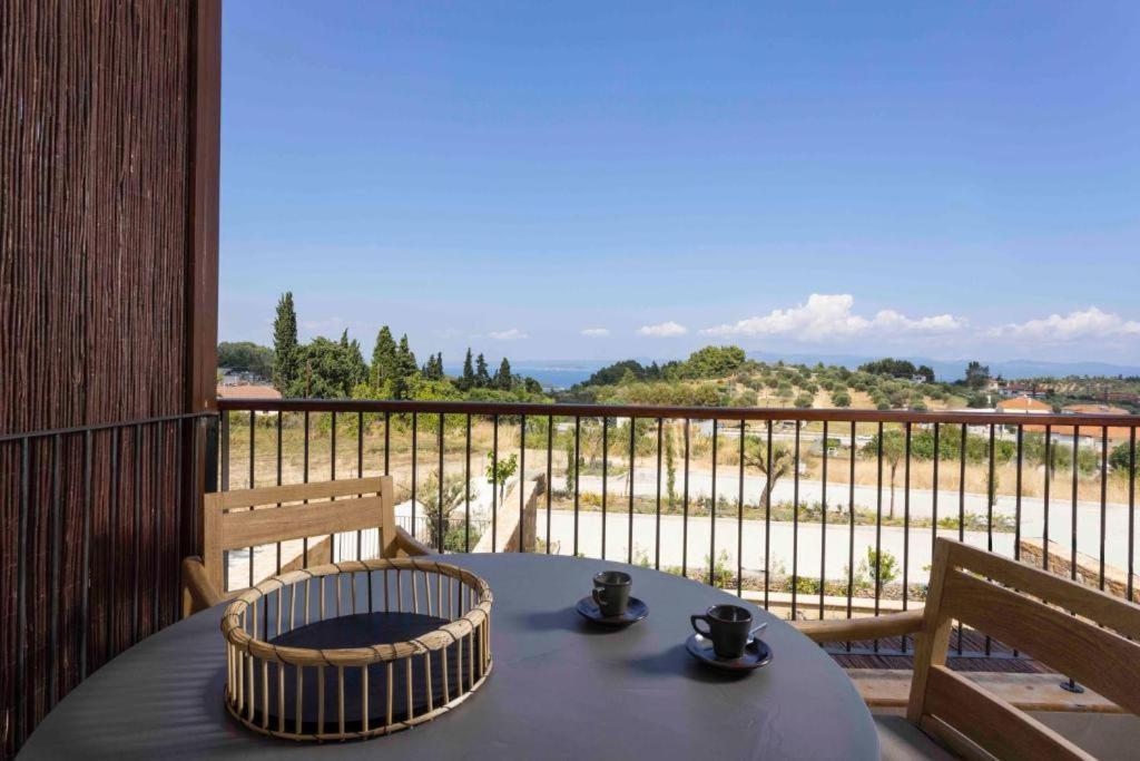 Pnoes Luxury Suites Палиури Экстерьер фото